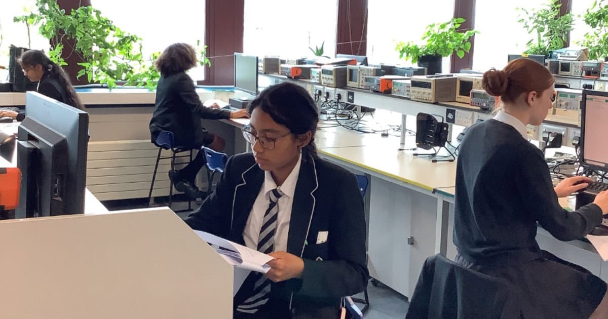 Students work on computers during 'Girls into Electronics' at University of Liverpool